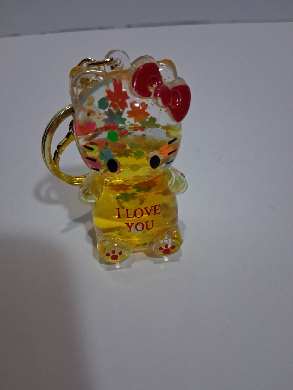 Cute Clear Kitty Keychain with Red Bow and Yellow Glitter
